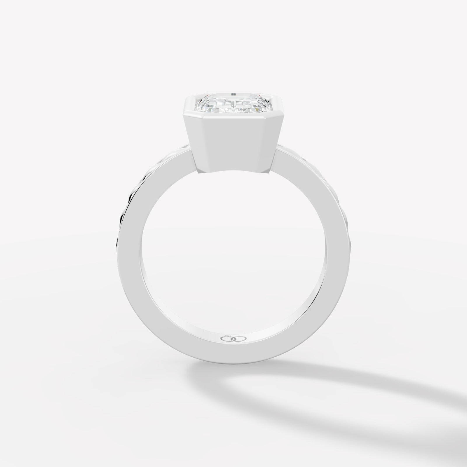 Captivating Emerald-Cut Lab-Grown Diamond Ring Framed in a Sleek Bezel Setting - Bijoux Eclore