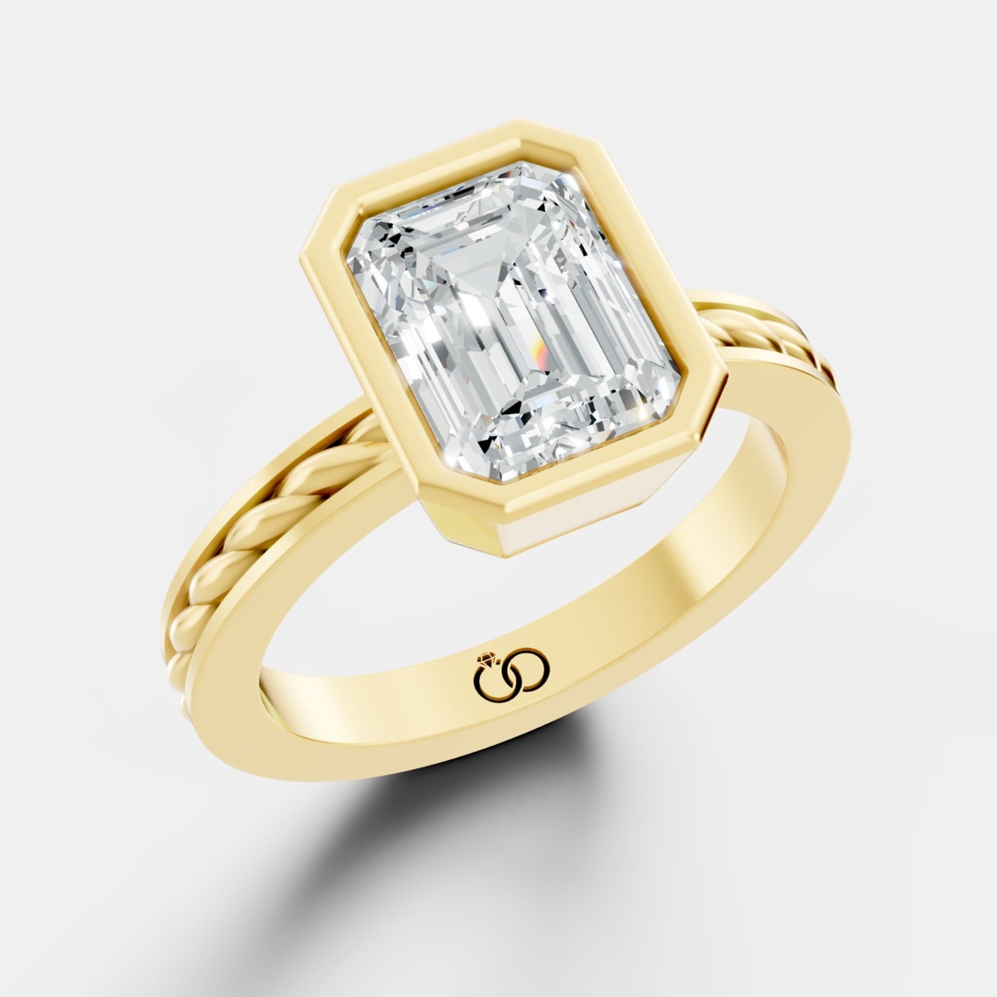 Captivating Emerald-Cut Lab-Grown Diamond Ring Framed in a Sleek Bezel Setting - Bijoux Eclore