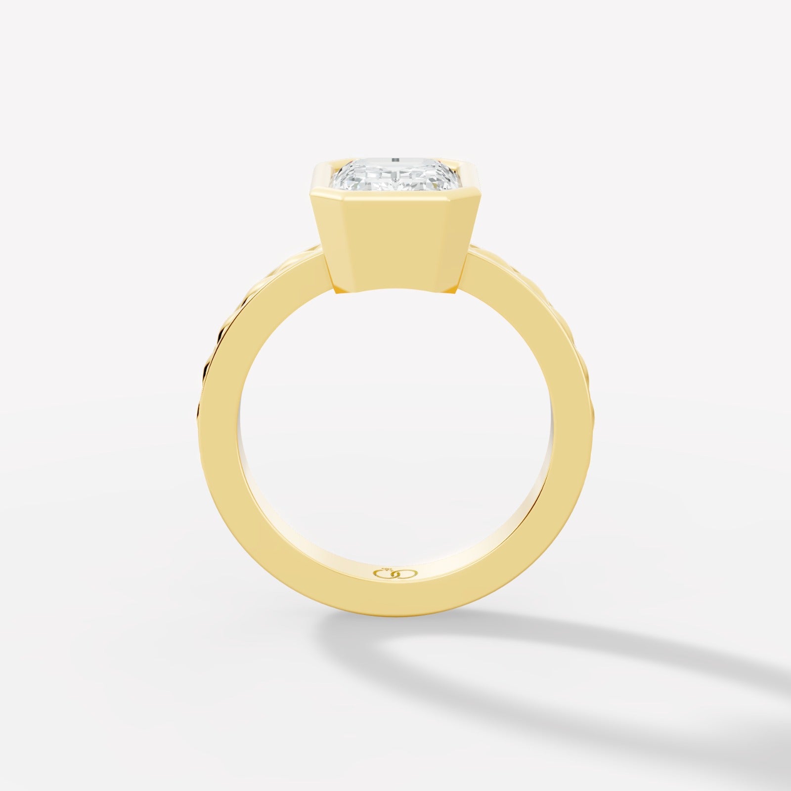 Captivating Emerald-Cut Lab-Grown Diamond Ring Framed in a Sleek Bezel Setting - Bijoux Eclore