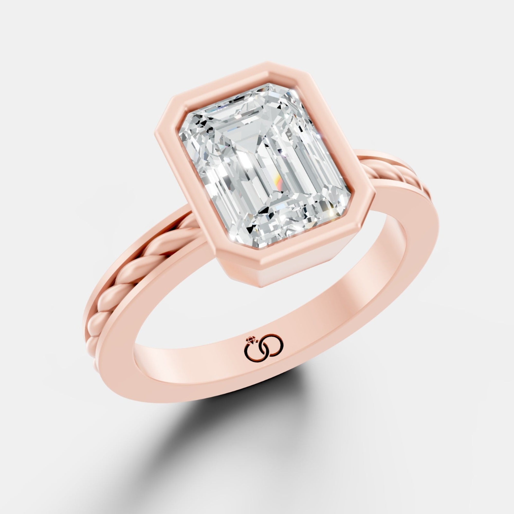 Captivating Emerald-Cut Lab-Grown Diamond Ring Framed in a Sleek Bezel Setting - Bijoux Eclore