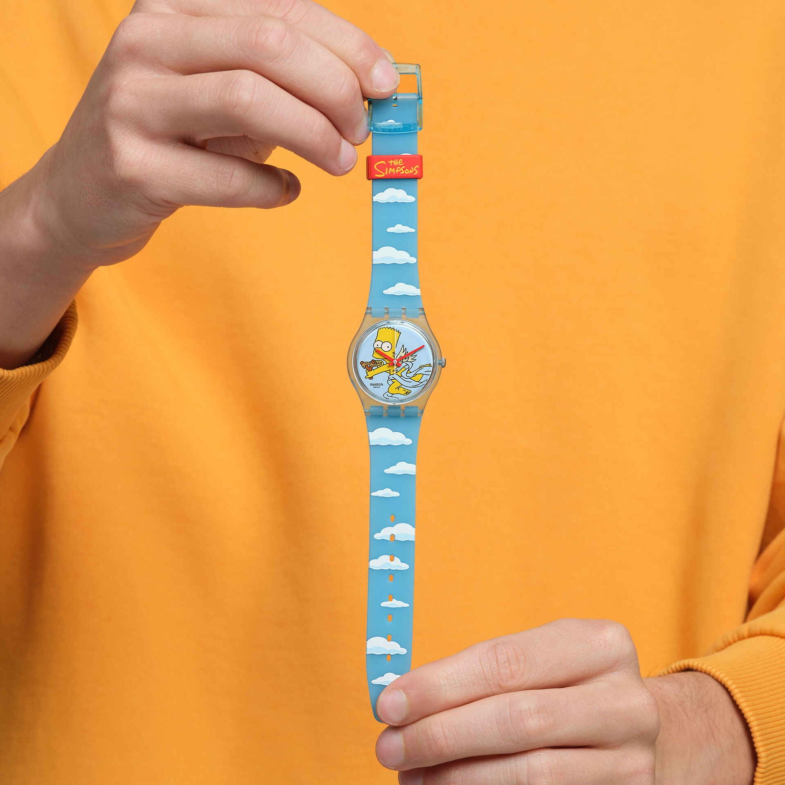 Swatch The Simpsons Angel Bart Light Blue Watch with Bart Cupid and Clouds SO28Z115